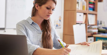 Student researching their dissertation proposal
